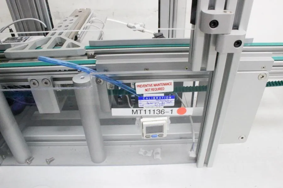 Keyence Misumi Custom Conveyer System for Accula Test Catridge Manufacturing